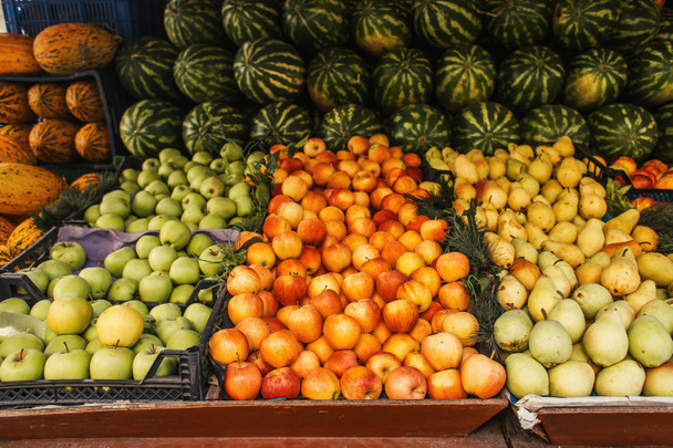 Fresh fruits on counter of outdoors market - Photo, Image