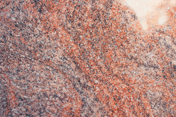 textured surface of multicolored granite stone, top view - Photo, Image