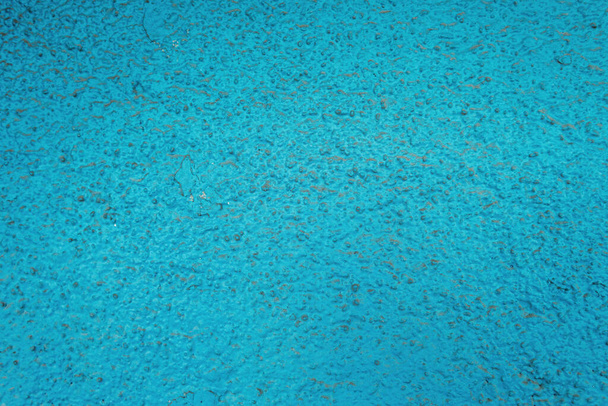 strukturierte Oberfläche mit blauem, grobkörnigem Putz, Draufsicht - Foto, Bild