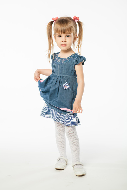 Cute blonde girl in blue dress - Valokuva, kuva