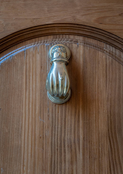 Door knocker detail in the city of Toledo, Spain - Photo, Image