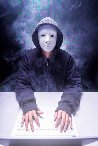cyber criminal with mask breaching sensitive data privacy crime offender - Photo, Image