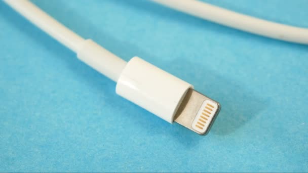 mobile phone charging white cable, usb charging plugs, closeup - Footage, Video