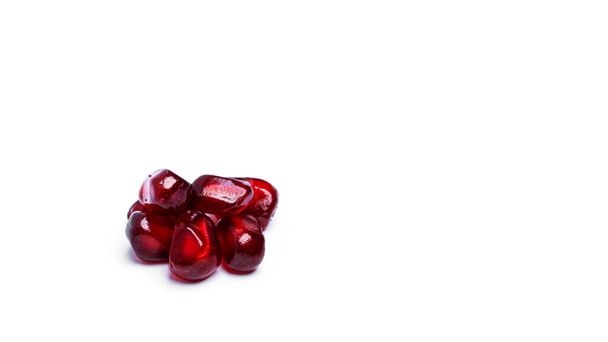 Pomegranate seeds on white background. - Photo, Image