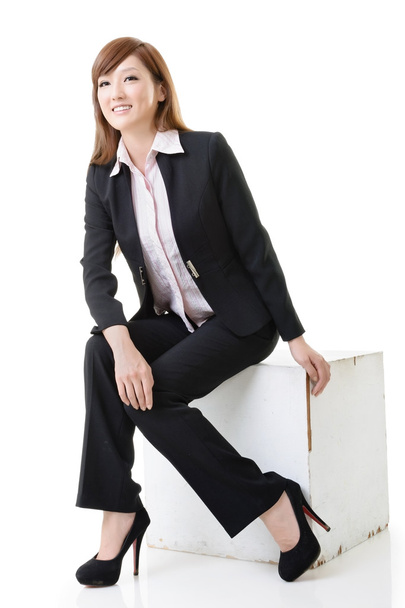 mujer de negocios sentado posición
 - Foto, Imagen
