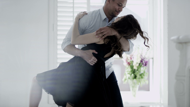 Couple dance in stylish apartment - Materiał filmowy, wideo