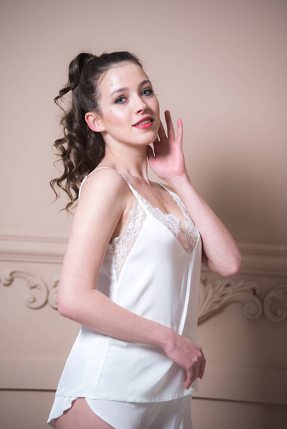 beautiful young woman in a white dress - Zdjęcie, obraz