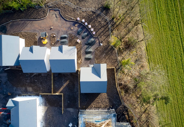 Edificio de construcción de viviendas en progreso vista aérea - Foto, Imagen