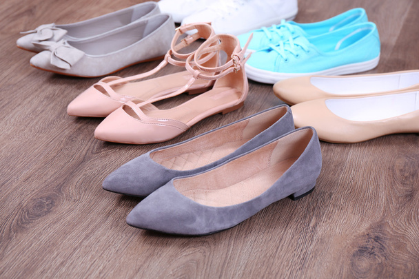 Different shoes on floor - Zdjęcie, obraz