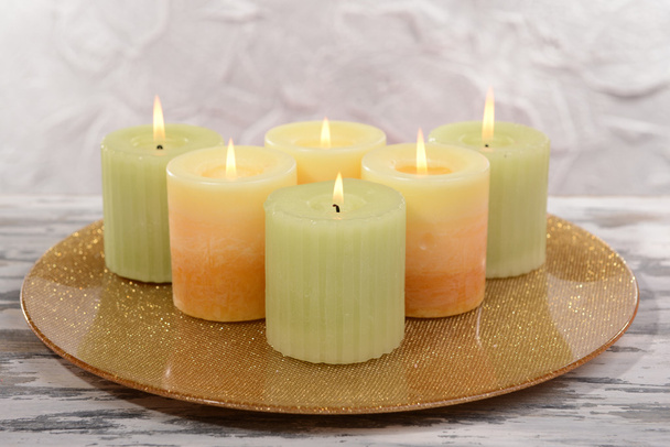 Beautiful candles on table on grey background - Photo, Image
