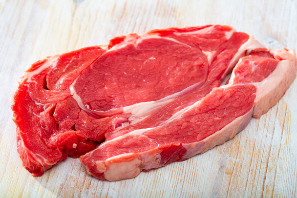 Raw veal steak - Fotó, kép