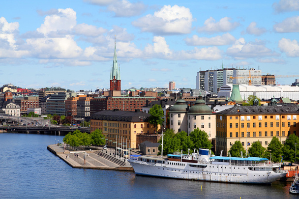 Stockholm, Sweden. View of famous Gamla Stan (the Old Town), Riddarholmen island. Restaurant and hotel ship. - Foto, immagini