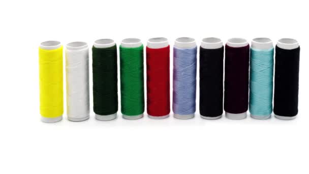 Set of colored thread. Close-up. Isolated over white background. - Footage, Video