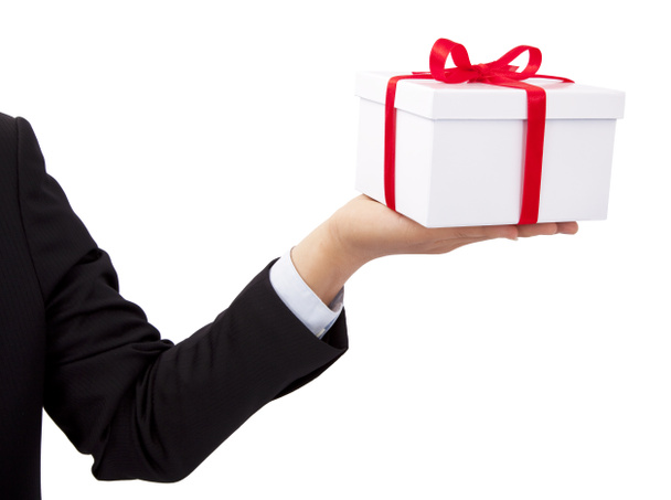 Homme d'affaires tenant et offrant un cadeau
 - Photo, image