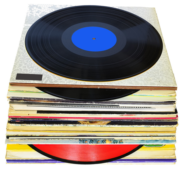 Pila de discos de vinilo de 33 rpm sobre fondo blanco
 - Foto, Imagen