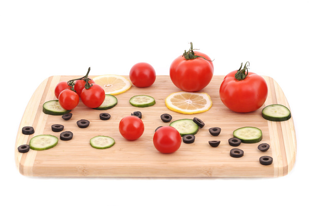 Composition of tomatoes and olives. - Фото, изображение