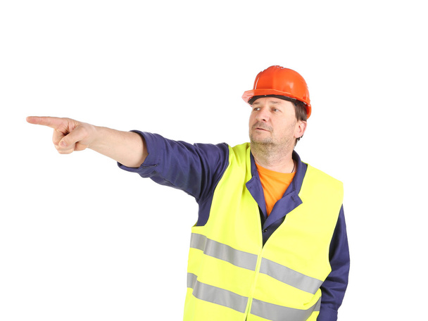 Worker in reflective waistcoat point the finger. - Фото, зображення