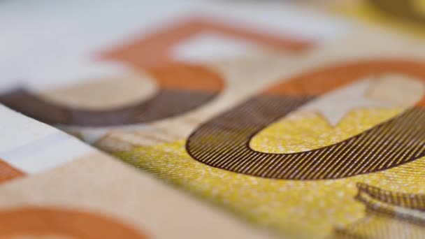 Spowolnienie rotacji banknotów euro 50. Makro zbliżenie - Materiał filmowy, wideo