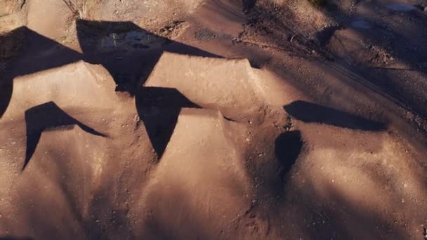 a dirt bike park with jumps from above  - Footage, Video