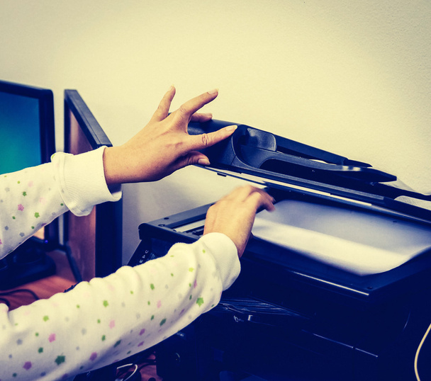 vintage hand with working copier  - Photo, Image