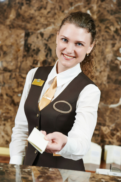 Hotel worker with key card - 写真・画像