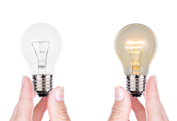 Hand with bulb isolated on white background - Φωτογραφία, εικόνα