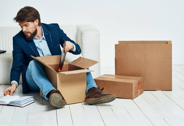 Business man boxes with lifestyle things packing office moving - Fotó, kép