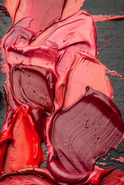 Texture of lip gloss. Trendy colors of the season - Photo, Image