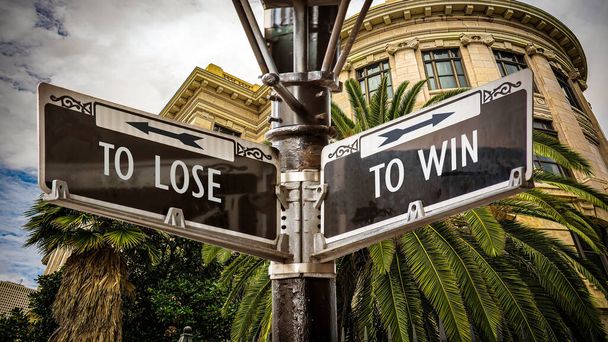 Señal de calle la dirección manera de ganar frente a perder
 - Foto, Imagen
