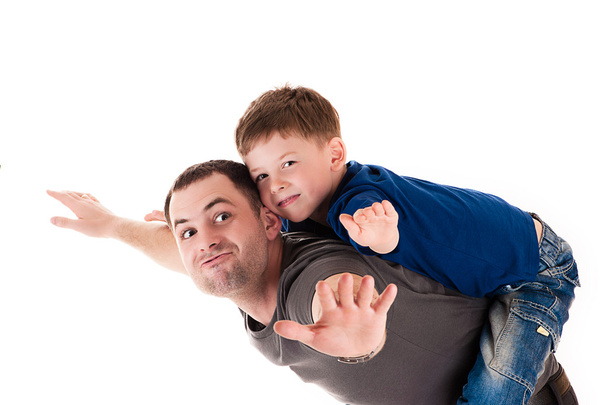 Padre e hijo volando
 - Foto, Imagen