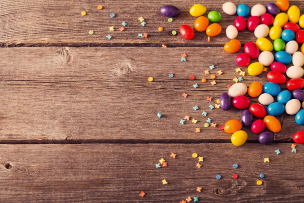sweets on wooden background - Foto, imagen