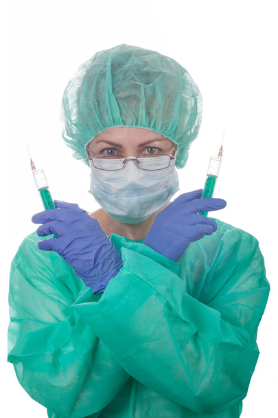Docteur femme tient une seringue médicale
 - Photo, image