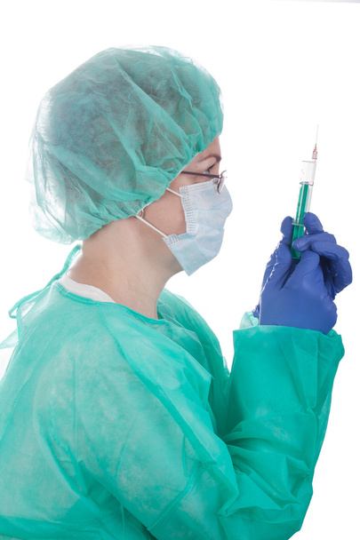 Doctor woman holds a medical syringe - Photo, Image