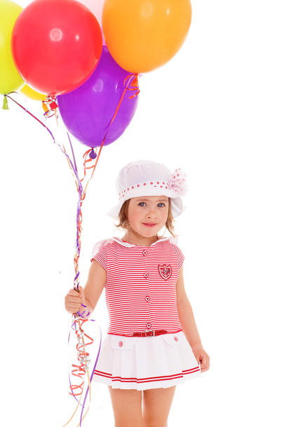 Charming girl with balloons. - Foto, imagen