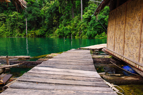 Walkway of Raft house homestay at lake river in natural attractions The need to travel by boat in the Ratchaprapha Dam at Khao Sok National Park, Surat Thani Province in Thailand - Fotó, kép