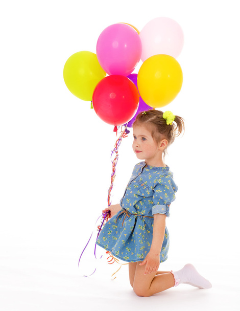 Charming girl with balloons. - Φωτογραφία, εικόνα