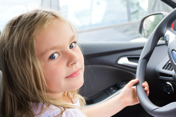 Cute girl driving car - Zdjęcie, obraz