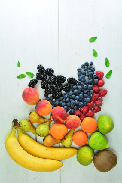 fresh fruits and berries on a white background - Photo, Image