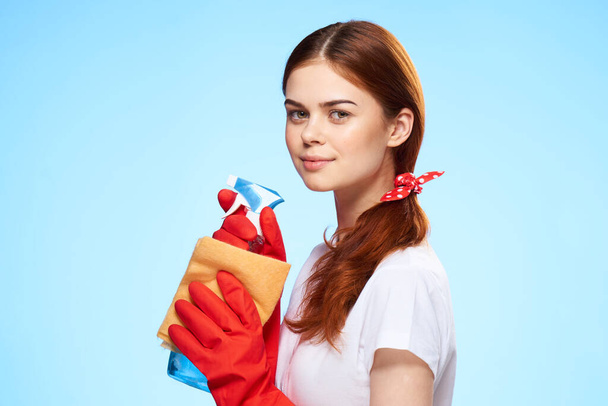 professional cleaning lady cleaning supplies work blue background - Valokuva, kuva