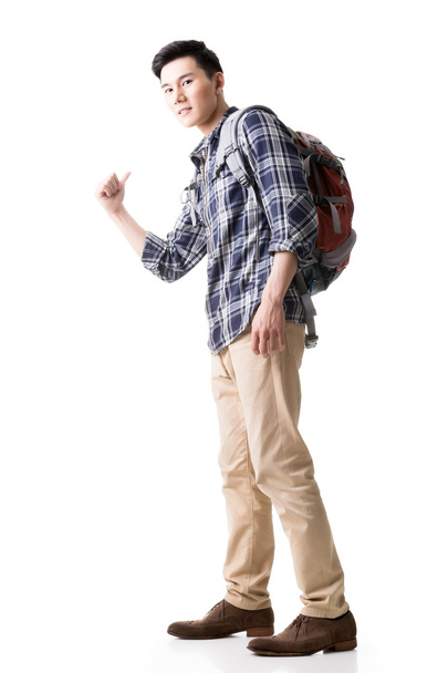 Asian young traveling man hitchhiking - Foto, Imagem