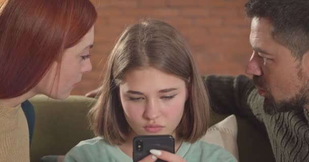 Parents scolding teenage daughter for addiction to gadgets - Footage, Video