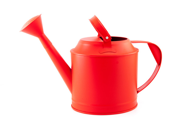 red watering can on a white background - Foto, Imagen