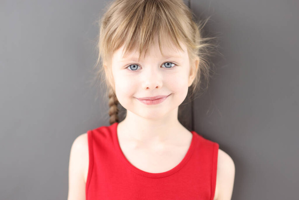 Portrait of little girl with blue eyes - Photo, Image