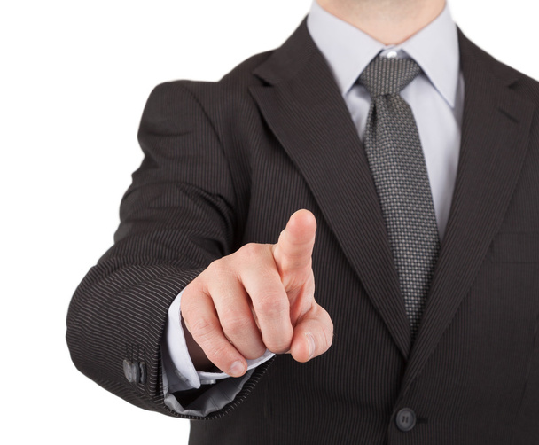 Businessman touching virtual screen or button - Photo, Image