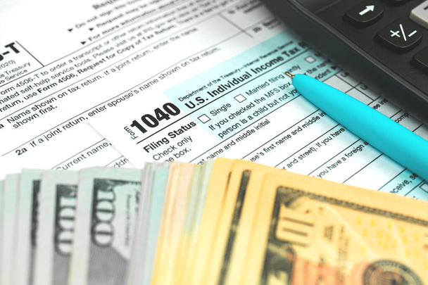 Formulario fiscal 1040, IRS estadounidense Impuesto sobre la renta del Servicio de Rentas Internas, foto de fondo - Foto, Imagen