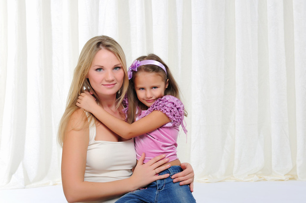Young mother and her young daughter - Foto, Bild
