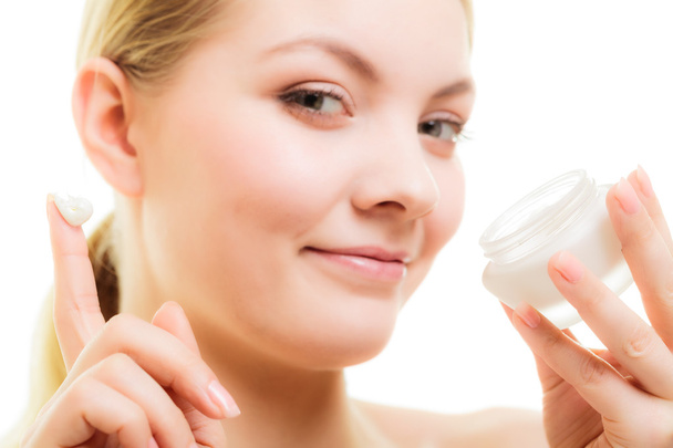Skin care. Girl applying moisturizing cream - Fotoğraf, Görsel