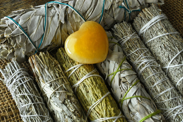A top view image of several healing sage smudge sticks bundles.  - Photo, Image
