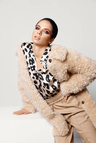brunette with bright makeup leopard print shirts autumn fashion luxury - Фото, изображение