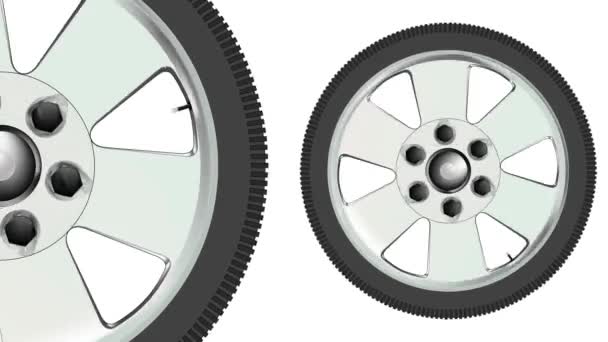 Una grande e una piccola ruota e pneumatico per automobili in alluminio entrambi girano a velocità diverse - Filmati, video